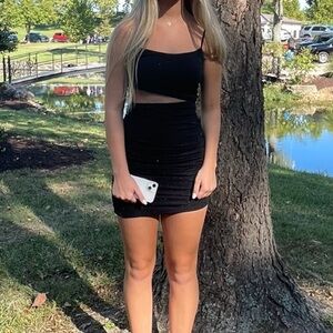Women’s little black dress with cut out